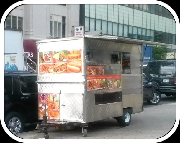 falafel cart on  corner in the city of Brooklyn, NYC